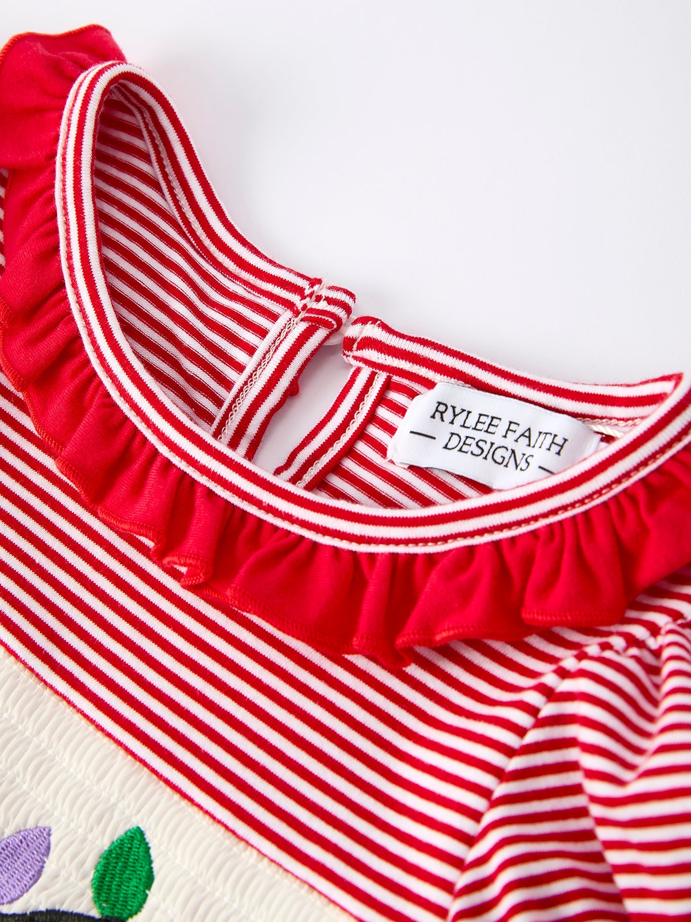 Holiday Girls Dress with Embroidered Christmas Lights and Red Bow Details