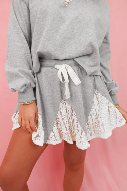 Light Grey Lace Patchwork Drop Shoulder Pullover Drawstring Skort 2pcs Outfit